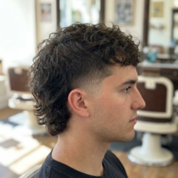 Burst Fade Wavy Mullet